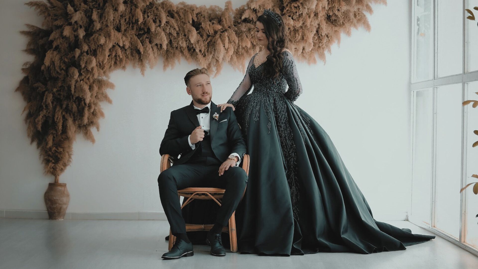 Couple sharing a joyful laugh during their engagement celebration.