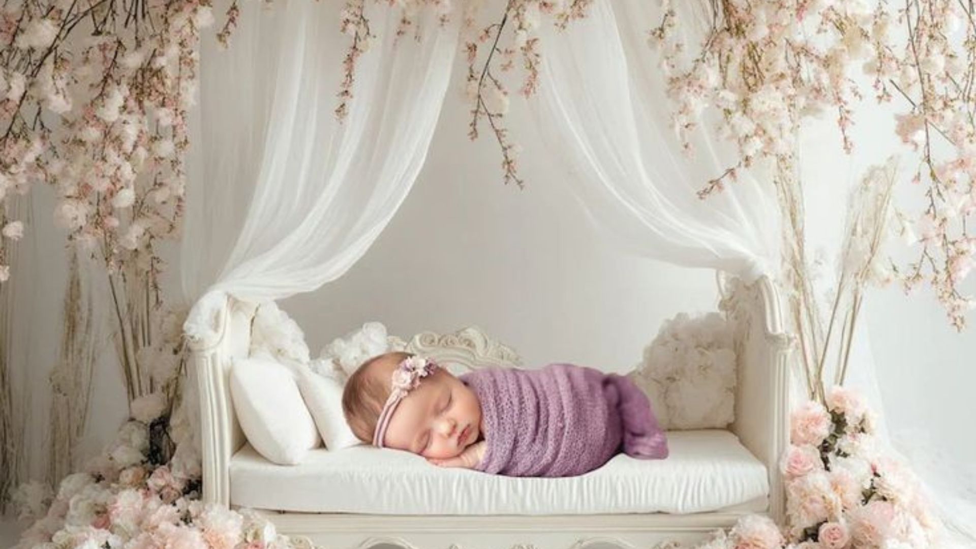Stylish young man posing confidently in a black and white outfit.